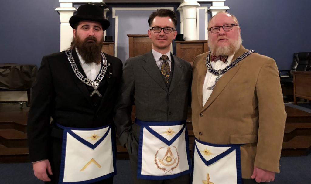 The Worshipful Master and Senior Warden of Friendship Masonic Lodge posing with WB Walter Lee, the Immediate Past Master. Just moments after gifting him a custom, hand-painted Past Master's apron.
